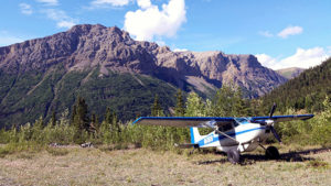 single engine airplane parked at Glacier Creek